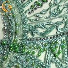Изощренная зеленая вышитая бисером ткань шнурка/шнурует материальную ткань для Bridal платья